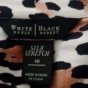 beautiful satin blouse with leopard print.